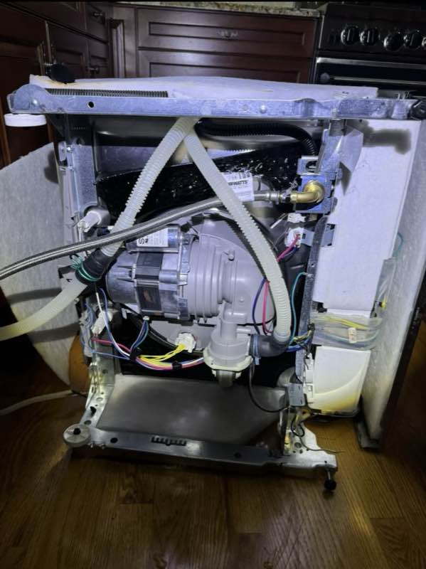 Washer repair in Tacoma replacing a drain pump